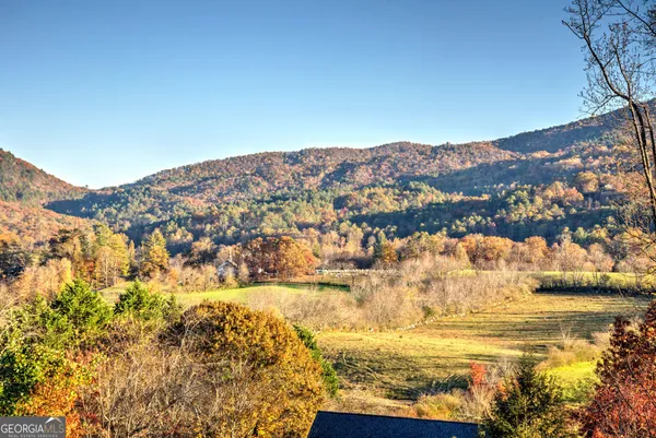 a view of ocean and mountains