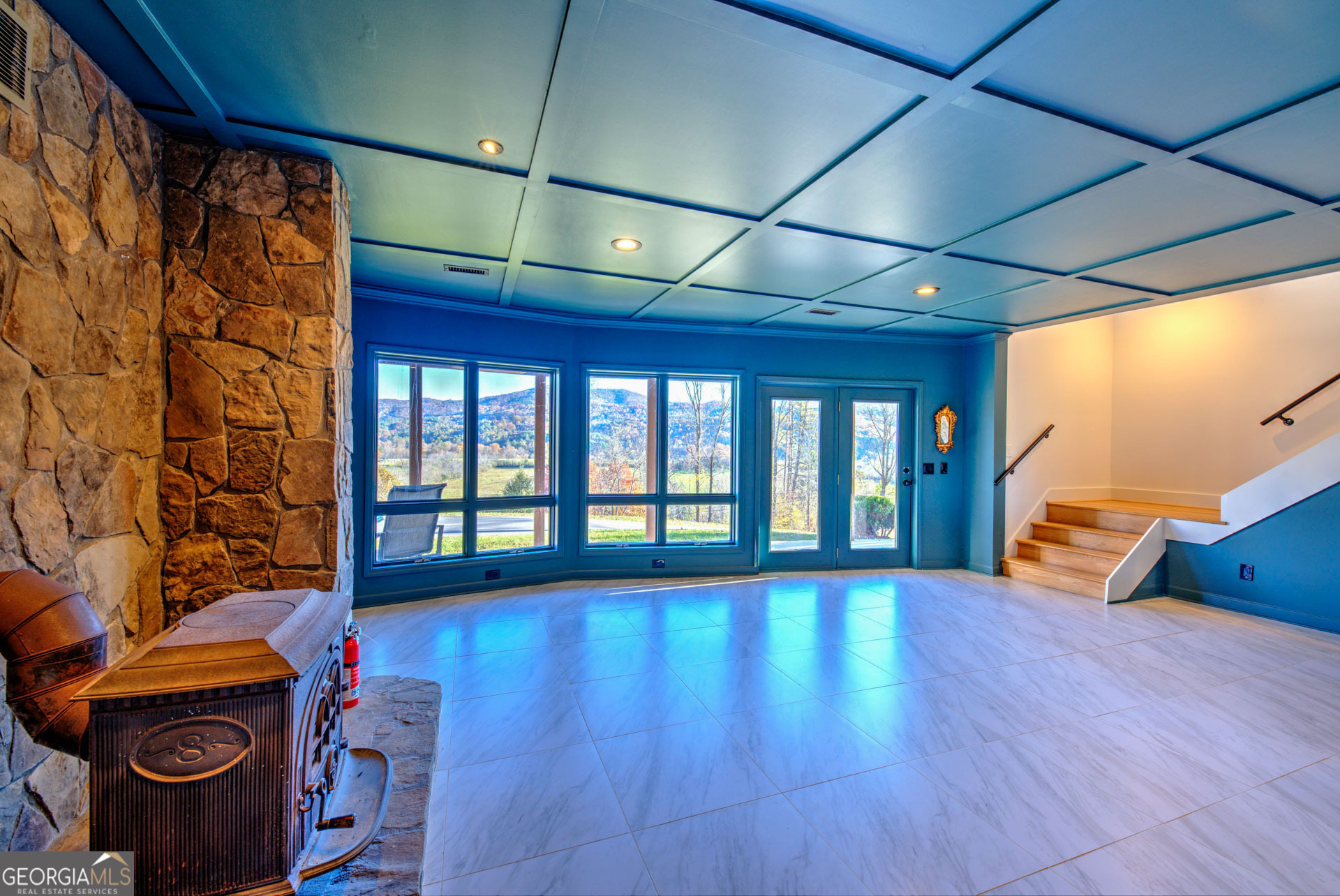5019 Wolffork Road Rabun Gap, GA 30568 - Photo 35 of 52 a view of an empty room with glass door