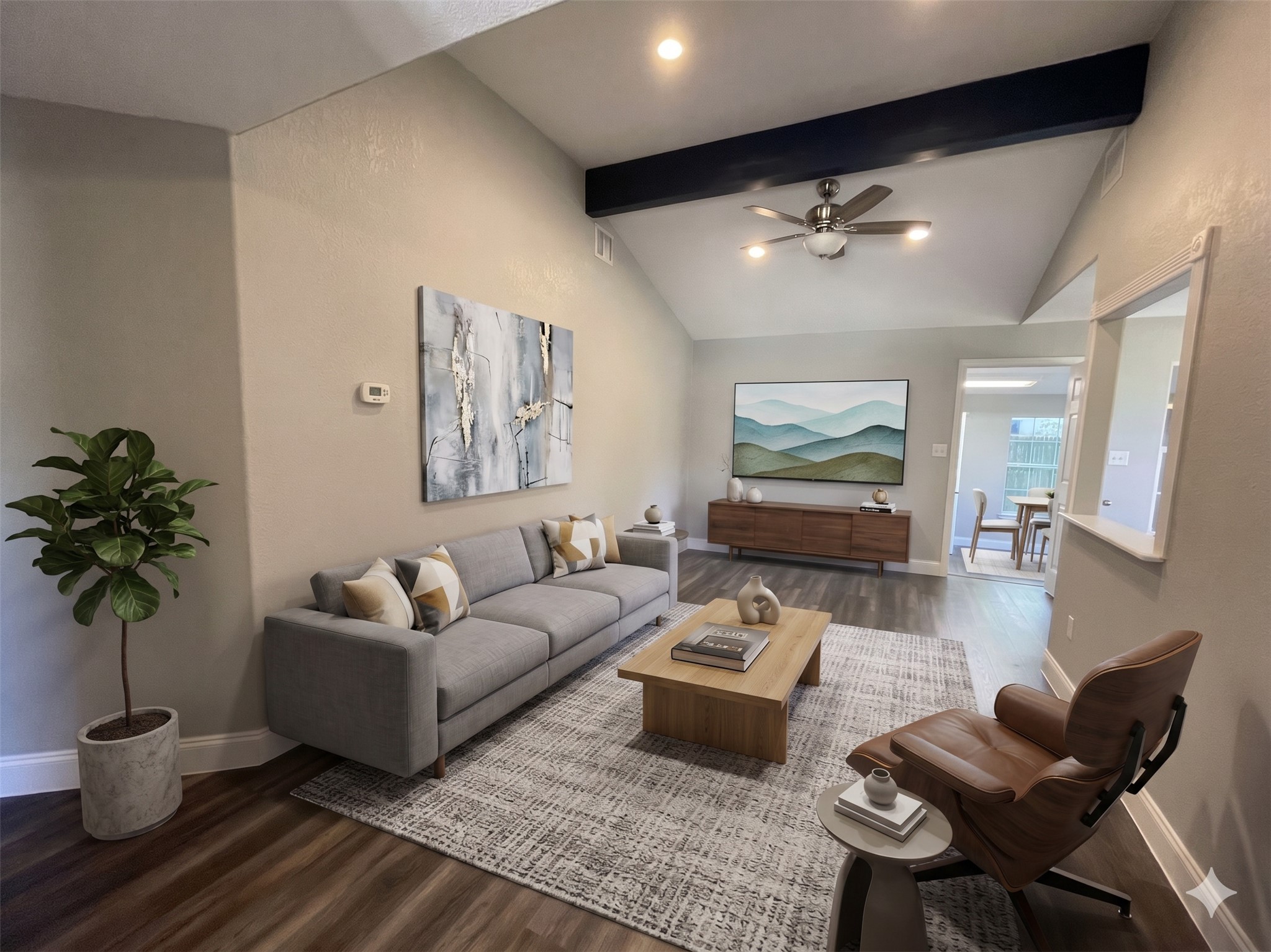 2004 Maple Street Georgetown, TX 78626 - Photo 4 of 31 Spacious living area featuring vaulted ceilings with exposed beams, recessed lighting, and wood-finish flooring