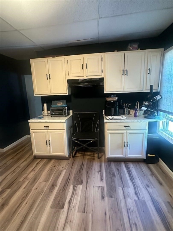79 Keith Street Springfield, MA 01108 - Photo 4 of 37 a kitchen with a sink a stove and cabinets