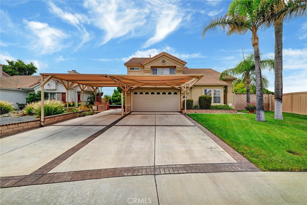 1551 Calathea Road Hemet, CA 92545 - Photo 1 of 1 a front view of a house with a yard