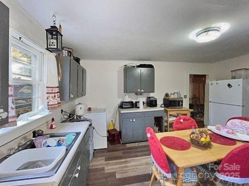 538 6th Street Chester, SC 29706 - Photo 21 of 22 a kitchen with a sink stove and chairs