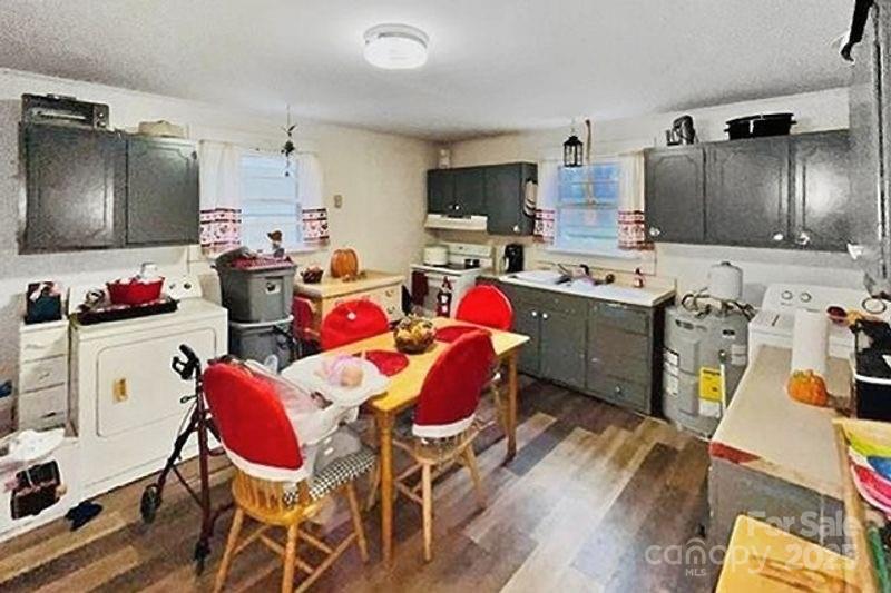 538 6th Street Chester, SC 29706 - Photo 4 of 22 a view of kitchen with dining table and chairs