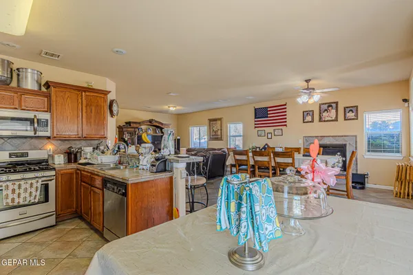 a view of a dining room with furniture and a livingroom