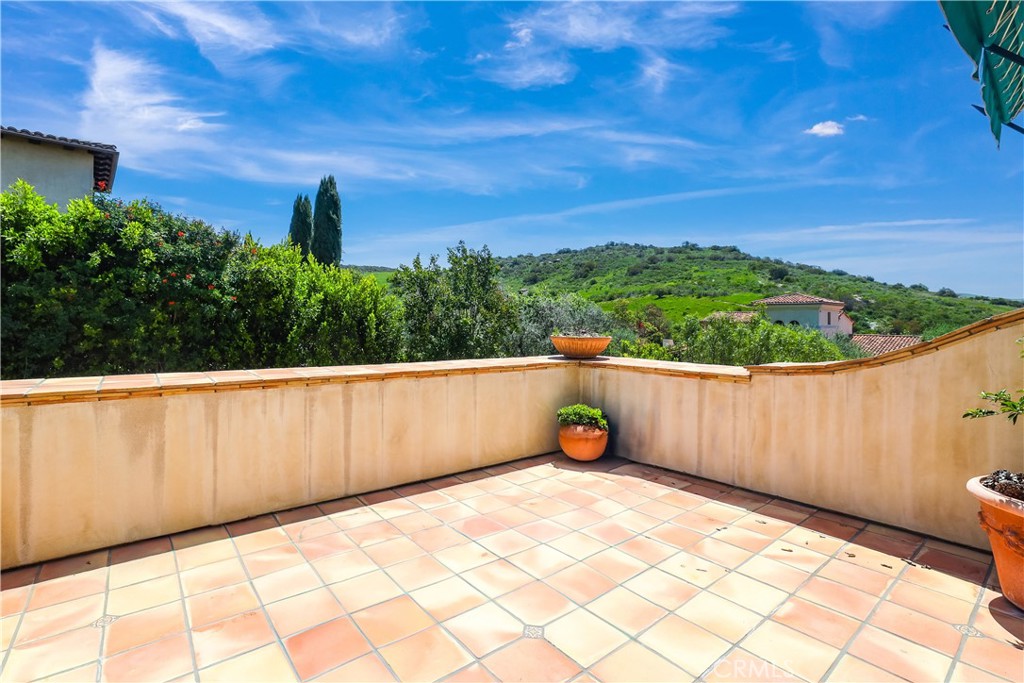 59 Canyon Creek Irvine, CA 92603 - Photo 37 of 65 large patio off of bedroom 3 with stunning canyon views