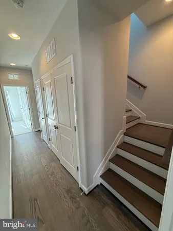 a view of a hallway with staircase