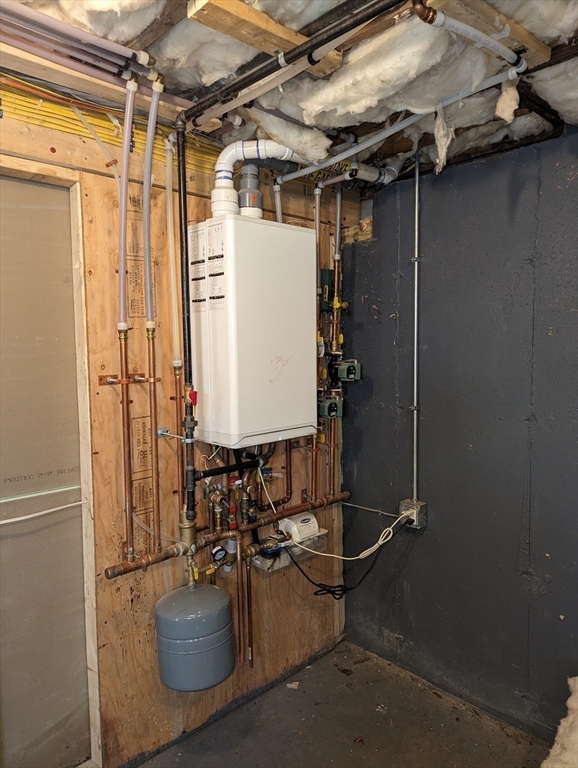 35 Carter Road Westminster, MA 01473 - Photo 20 of 20 a room with water heater and a cabinet