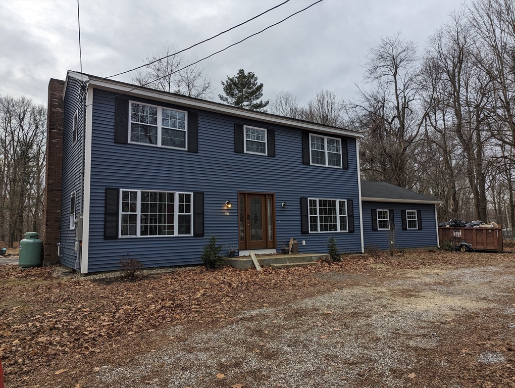 35 Carter Road Westminster, MA 01473 - Photo 2 of 20 a front view of a house with a garden