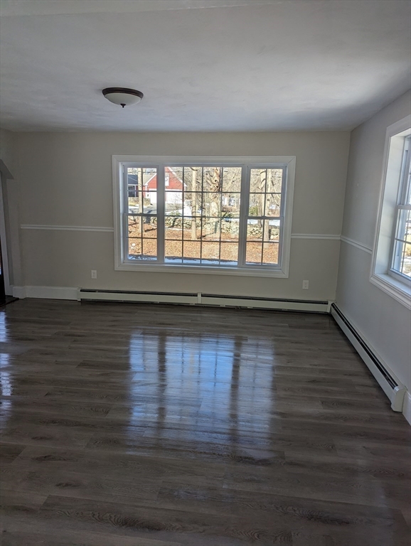 35 Carter Road Westminster, MA 01473 - Photo 9 of 20 an empty room with wooden floor and windows