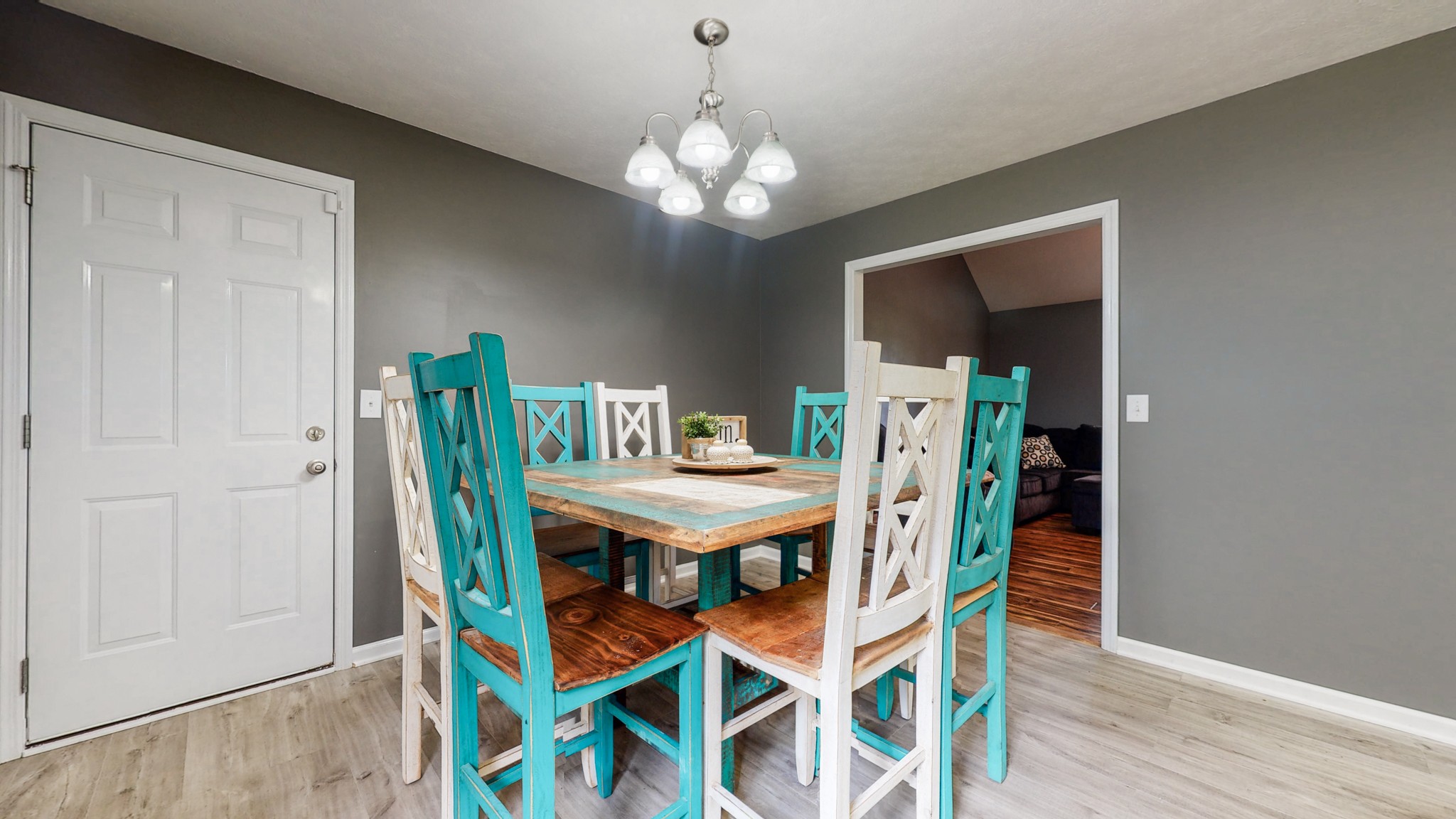 93 Snow Road Flintville, TN 37335 - Photo 3 of 20 a view of a dining room with furniture and wooden floor
