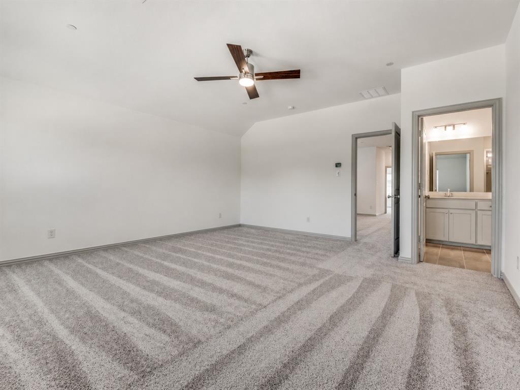 8913 Swallowtail Street Frisco, TX 75035 - Photo 26 of 38 a view of a livingroom with a hardwood floor and a ceiling fan