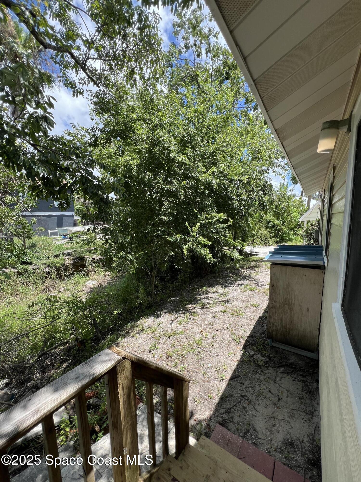 6500 June Drive Cocoa, FL 32926 - Photo 20 of 21 a view of balcony with wooden floor