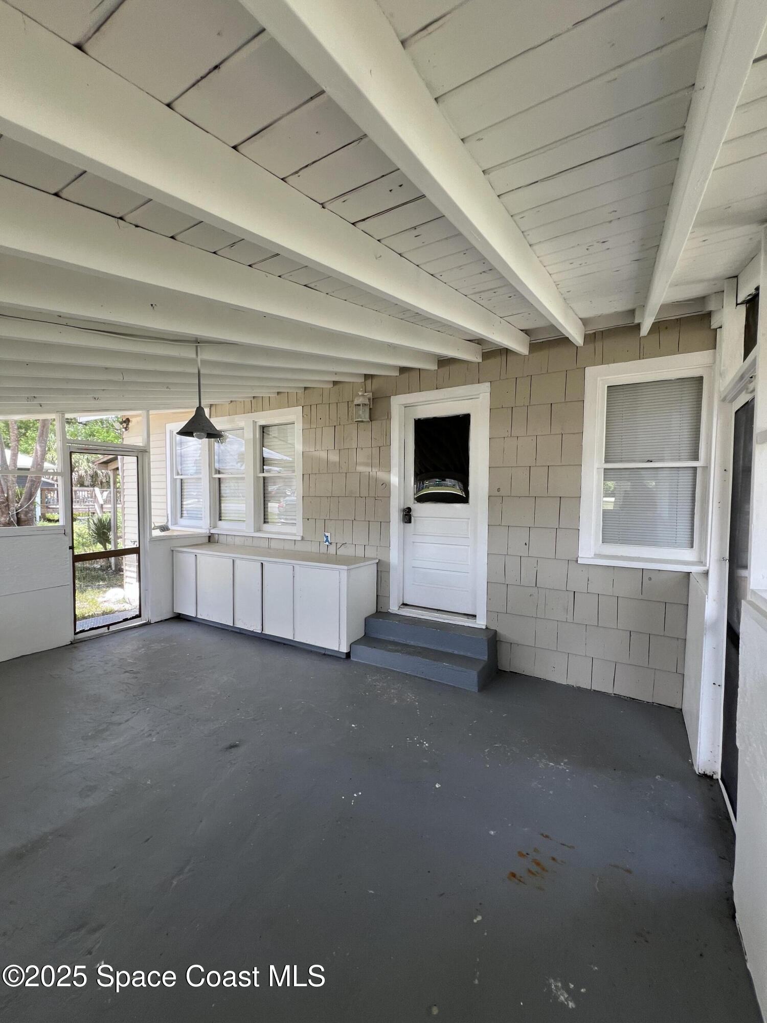 6500 June Drive Cocoa, FL 32926 - Photo 21 of 21 a view of an empty room with a window