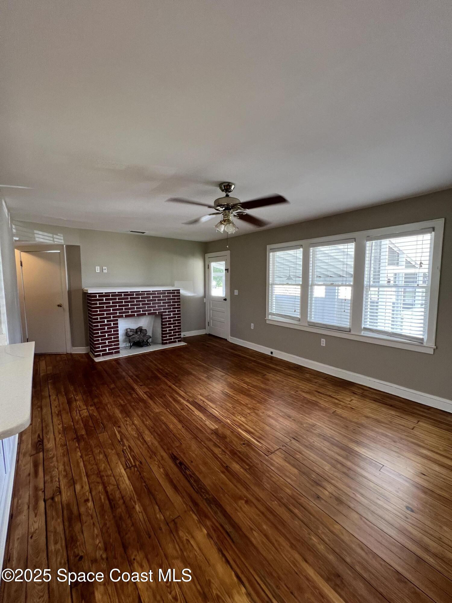 6500 June Drive Cocoa, FL 32926 - Photo 6 of 21 a bedroom with a bed and window