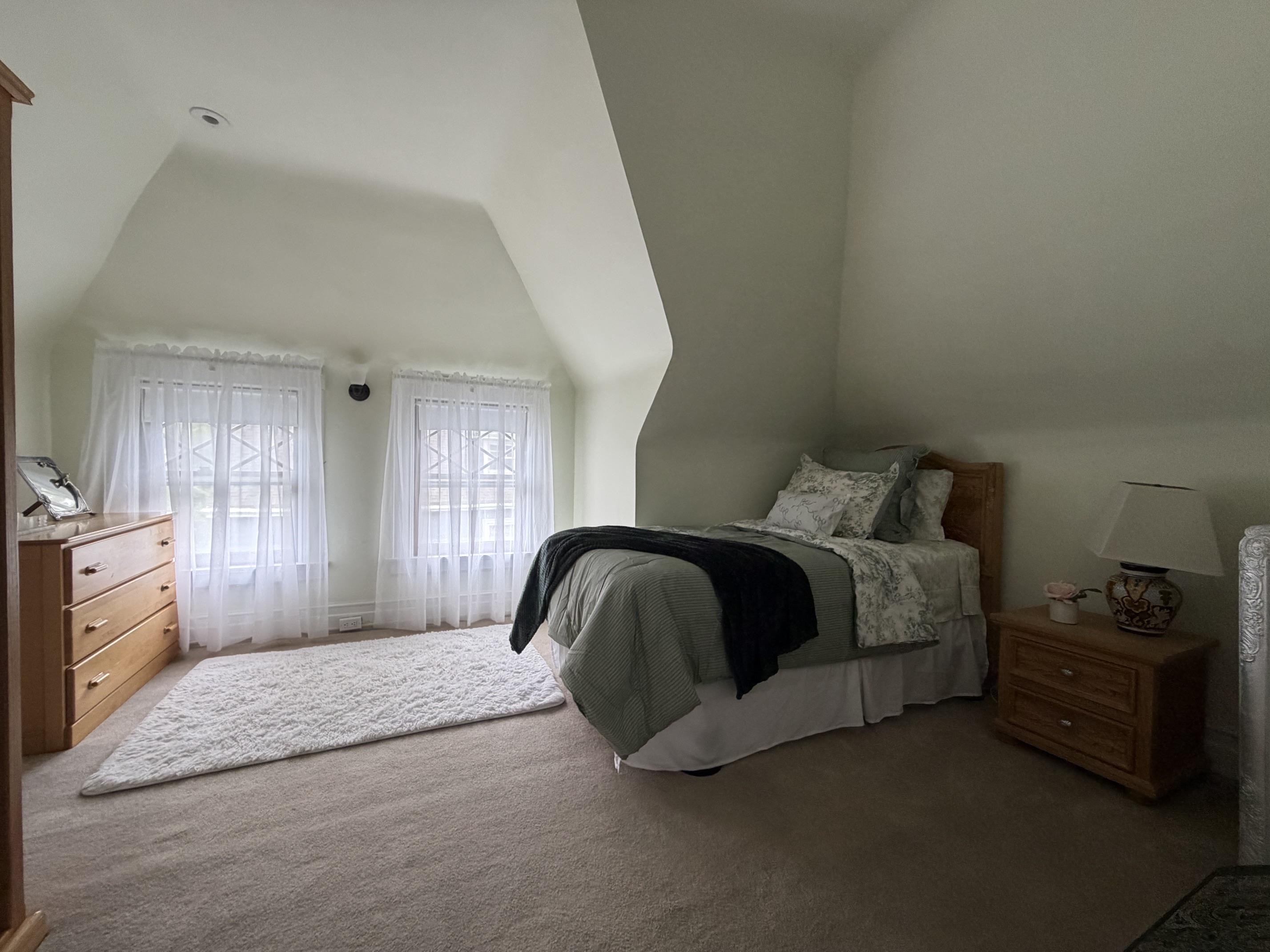 88 Edgemont Road Montclair, NJ 07043 - Photo 38 of 50 a bedroom with a bed and a tv