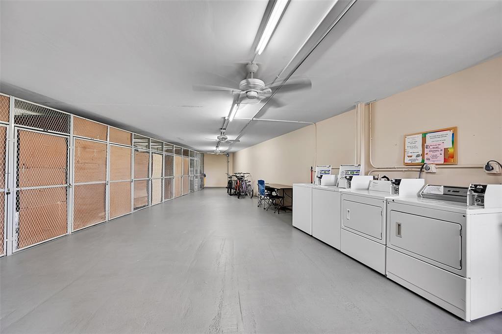 1901 Bermuda Circle, Unit L3 Coconut Creek, FL 33066 - Photo 9 of 27 a large white room with cabinets