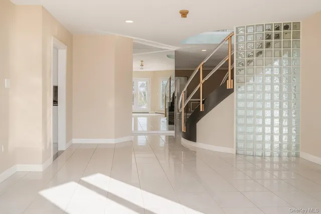 a view of a livingroom with furniture and windows