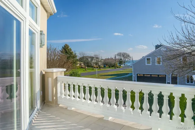 view of the house with a lake view