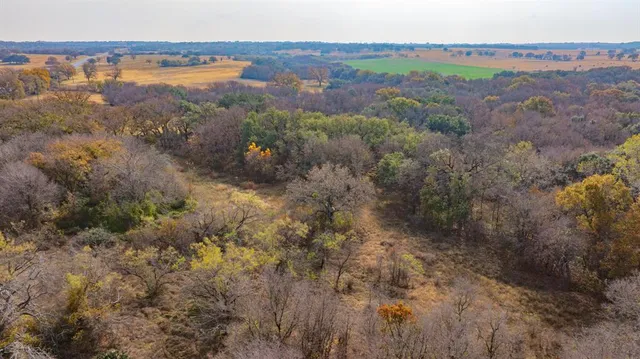 a view of a lake with mountains in the background