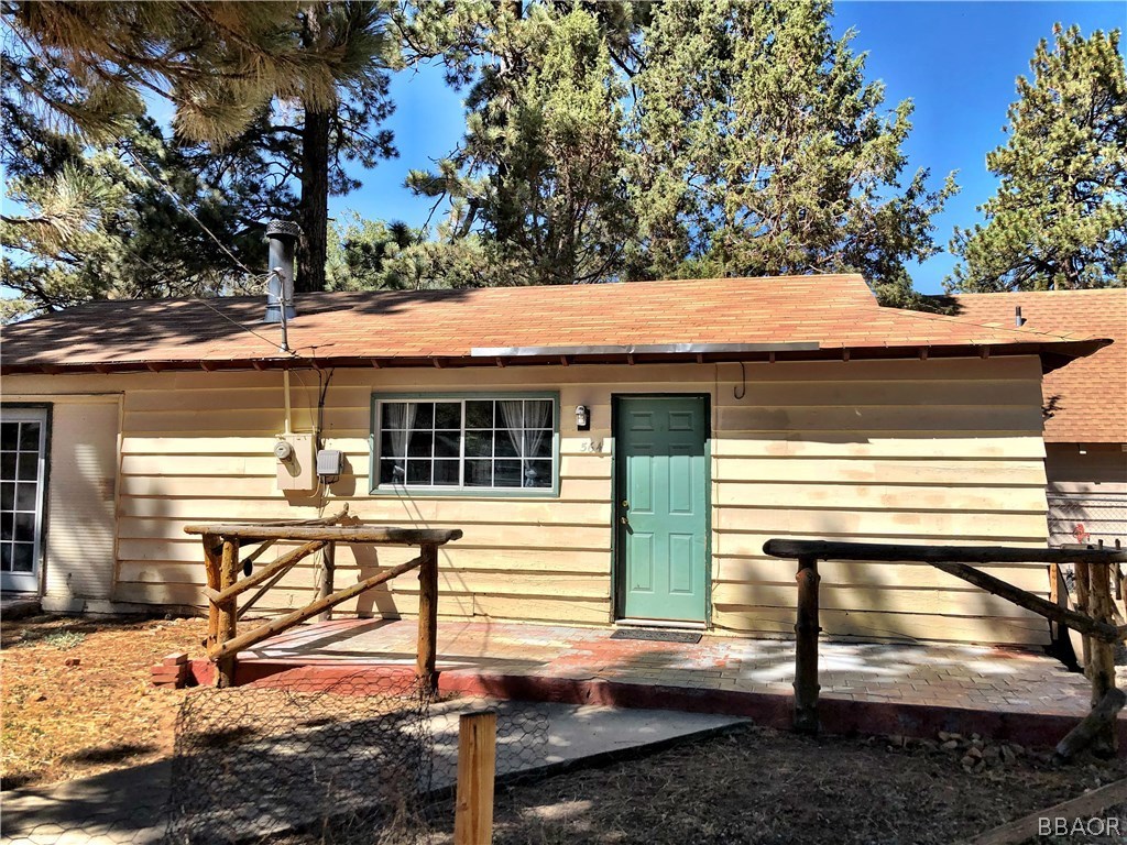 564 Riverside Avenue Sugarloaf, CA 92386 - Photo 1 of 17 a view of house with backyard outdoor seating