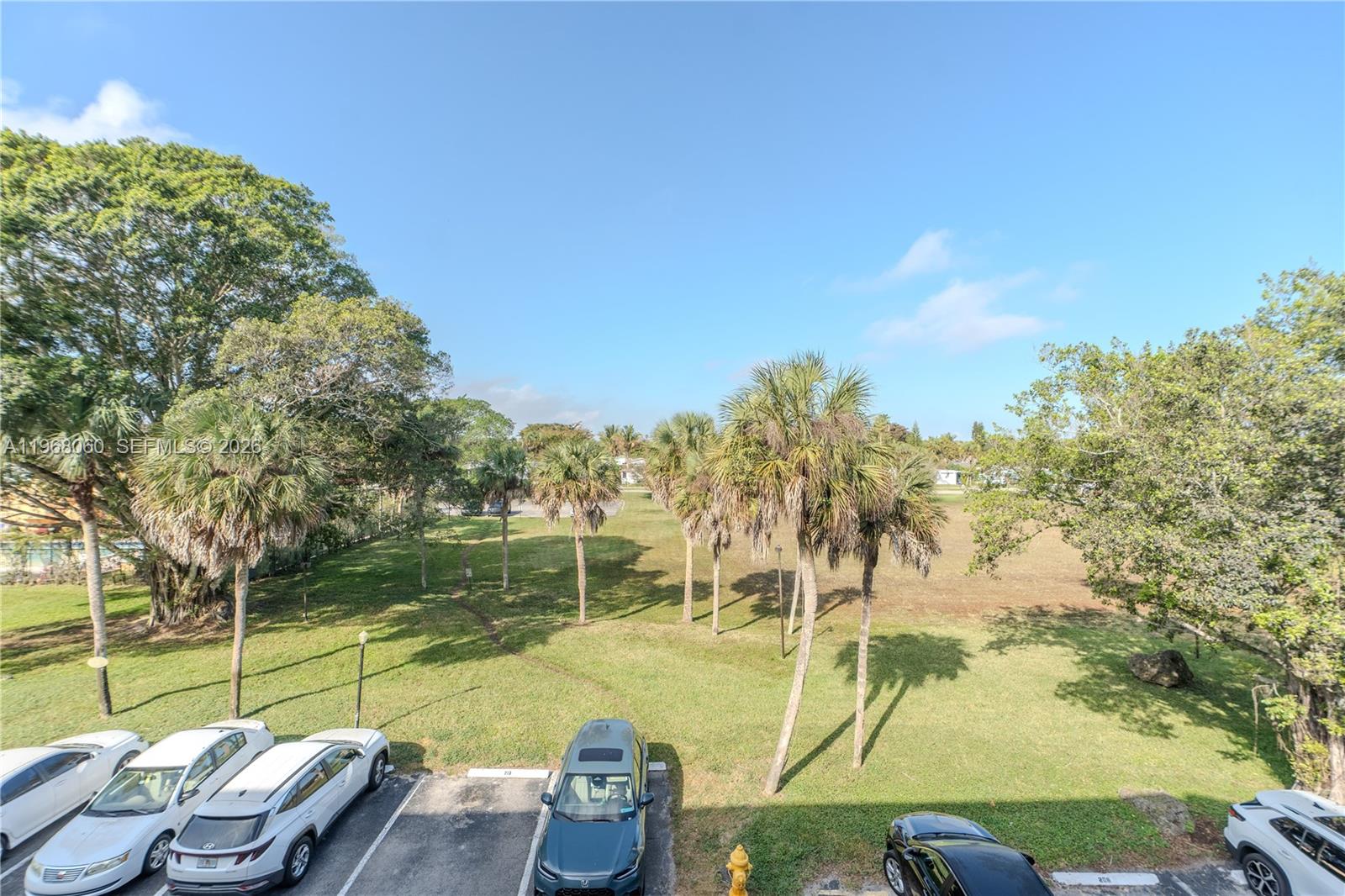 430 Commodore Drive, Unit 314 Plantation, FL 33325 - Photo 15 of 54 a view of an ocean with a floor to ceiling window