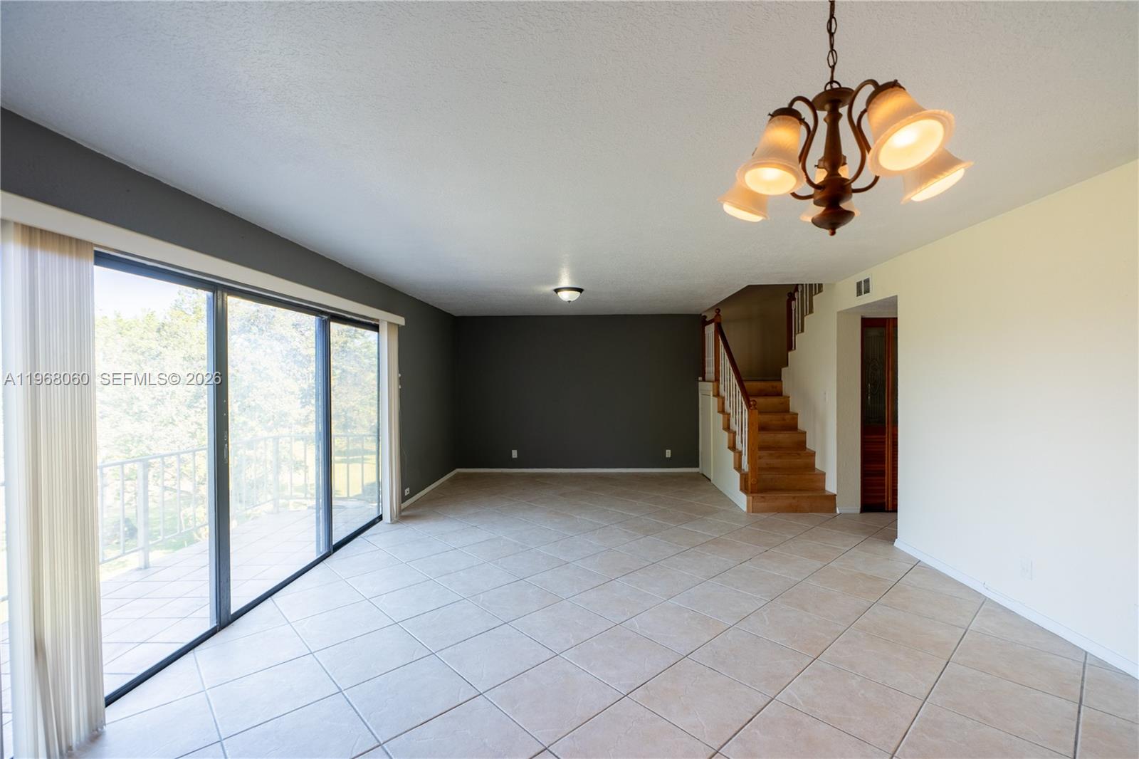 430 Commodore Drive, Unit 314 Plantation, FL 33325 - Photo 20 of 54 a view of a livingroom with a staircase
