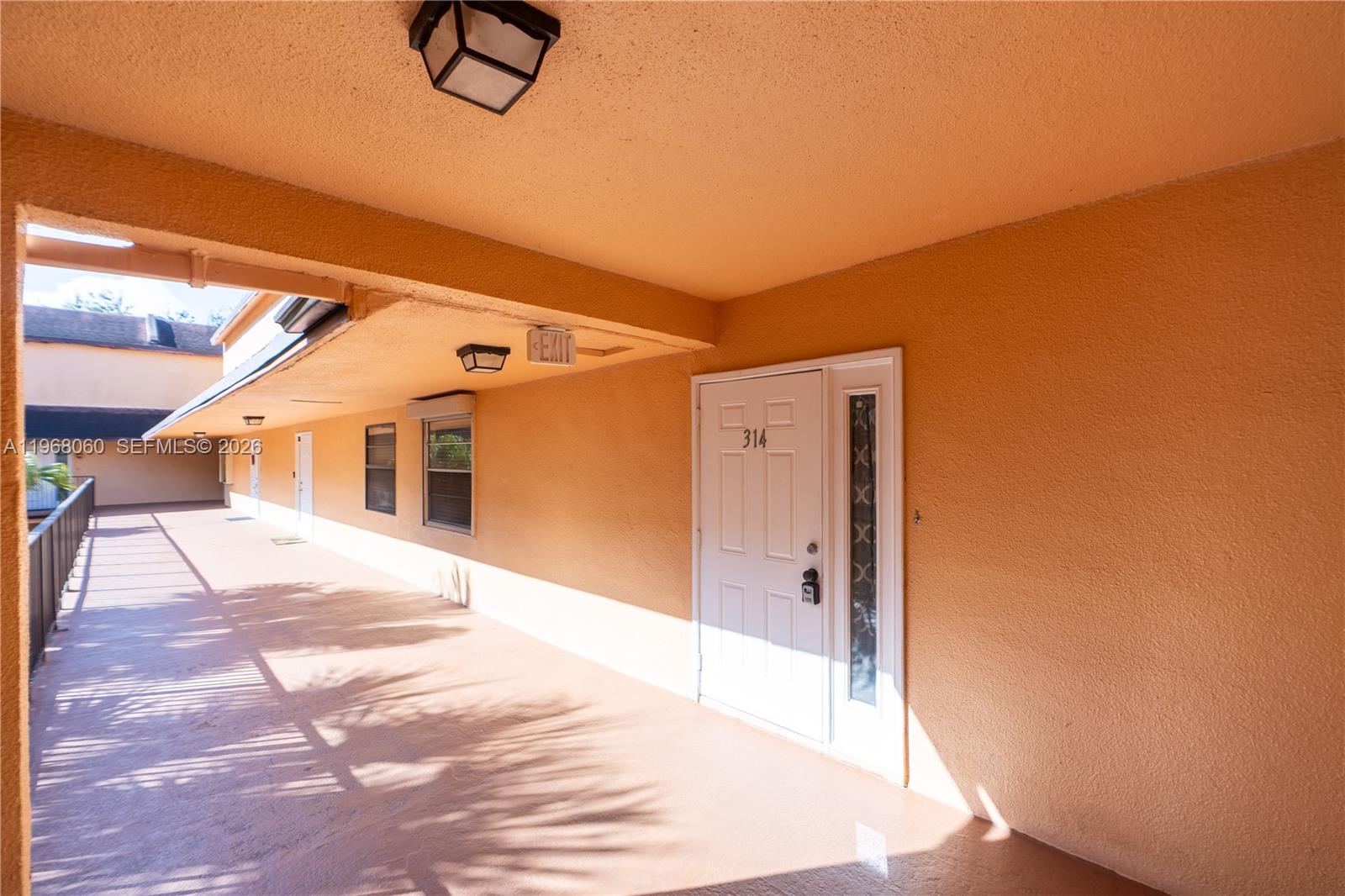 430 Commodore Drive, Unit 314 Plantation, FL 33325 - Photo 21 of 54 a view of a hallway with wooden floor