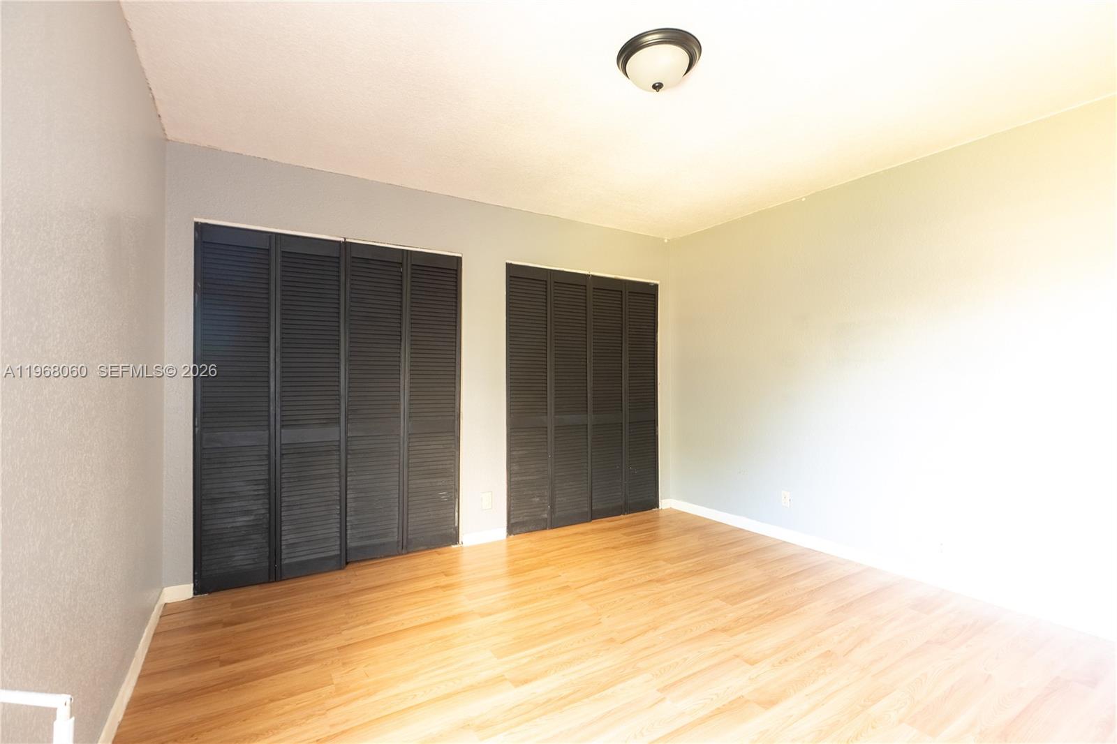 430 Commodore Drive, Unit 314 Plantation, FL 33325 - Photo 22 of 54 a view of a livingroom with wooden floor