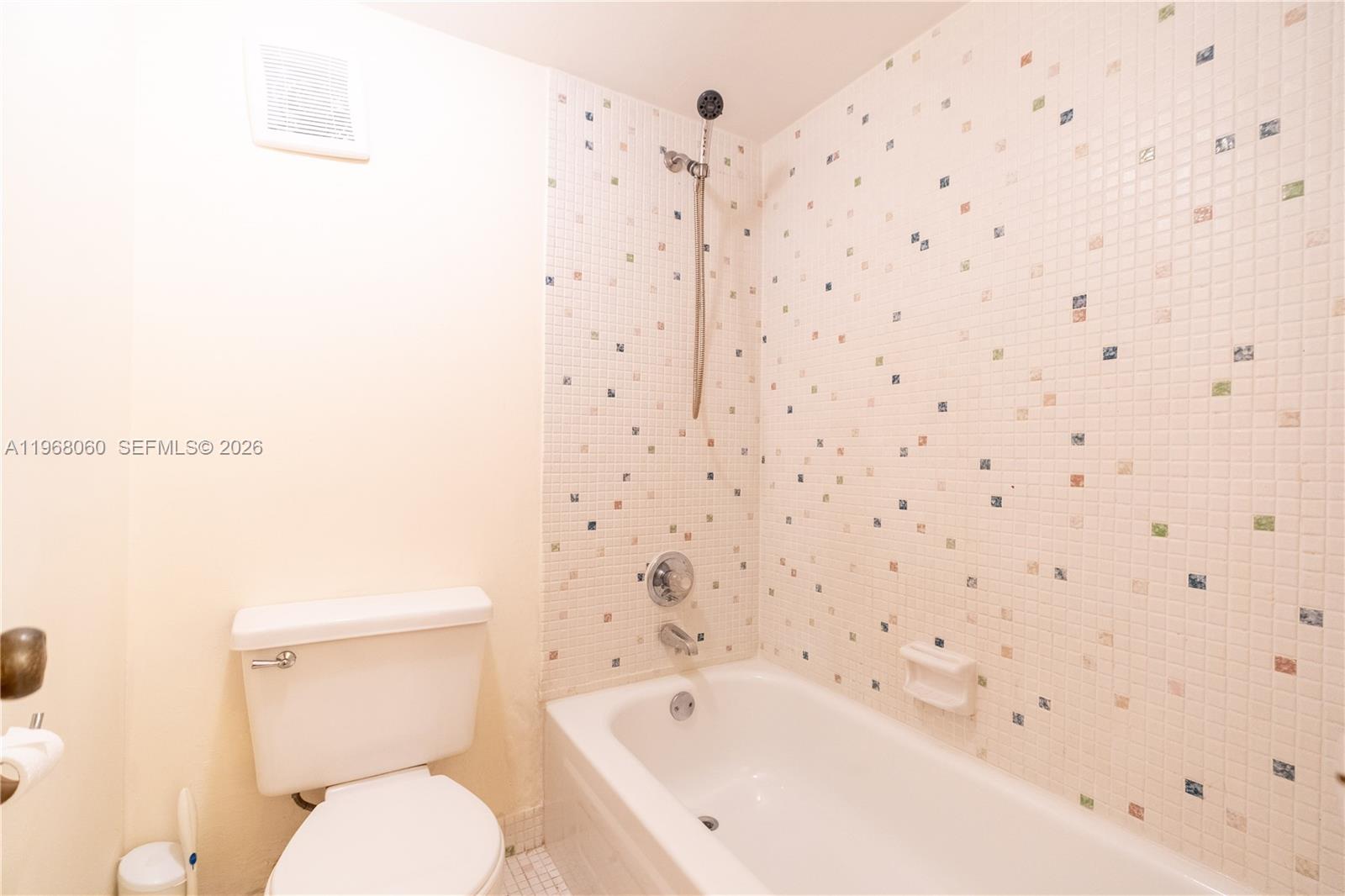 430 Commodore Drive, Unit 314 Plantation, FL 33325 - Photo 24 of 54 a bathroom with a bathtub and a toilet