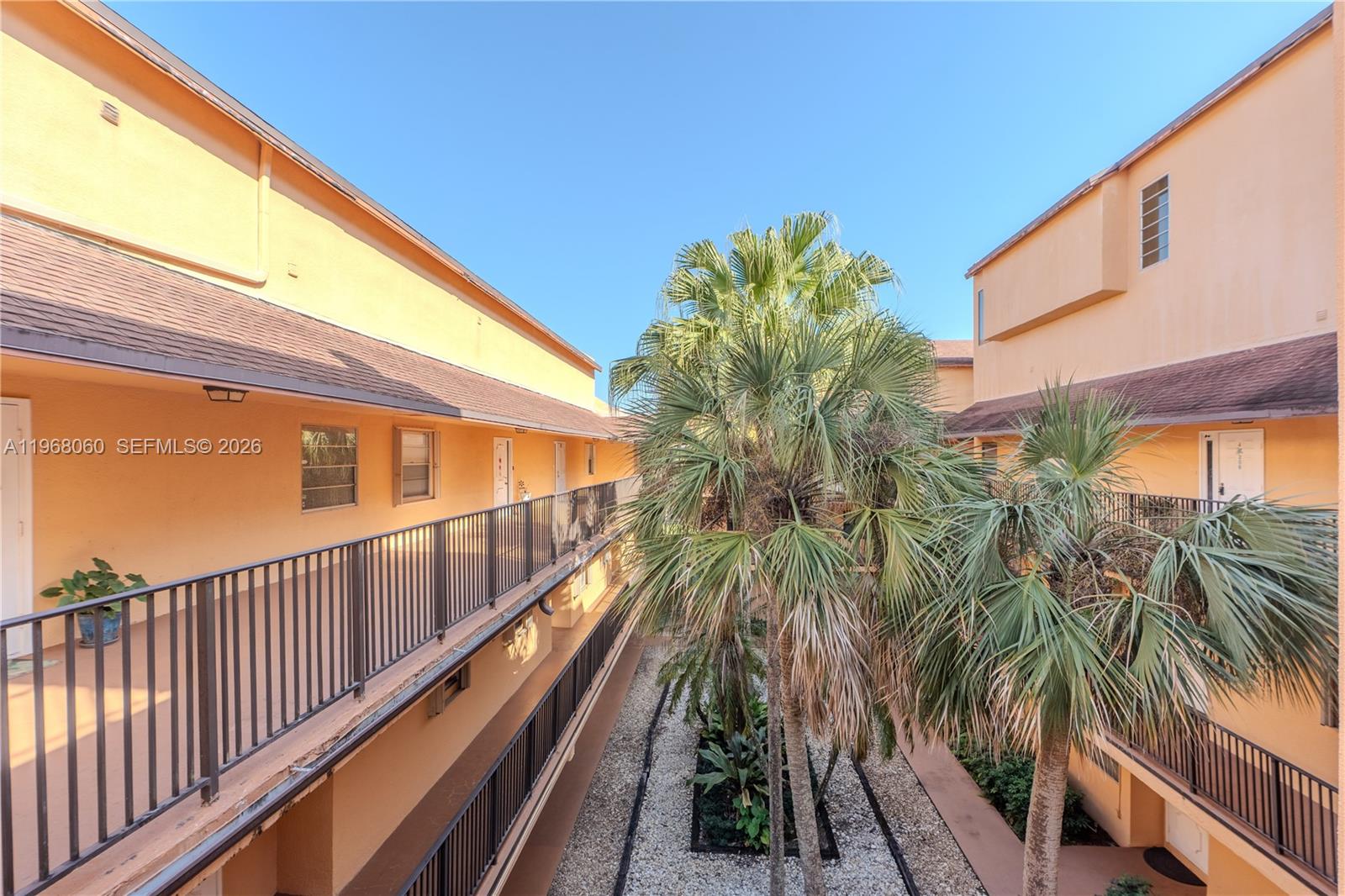 430 Commodore Drive, Unit 314 Plantation, FL 33325 - Photo 30 of 54 a view of balcony with potted plants