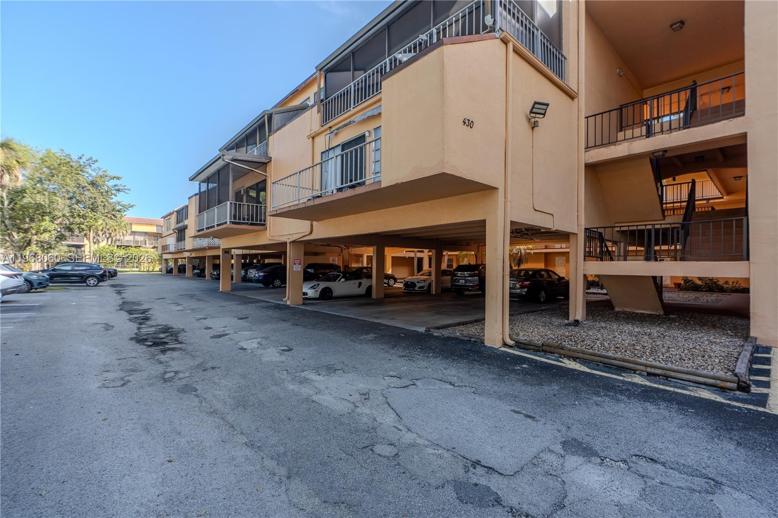 430 Commodore Drive, Unit 314 Plantation, FL 33325 - Photo 49 of 54 a view of a street with cars
