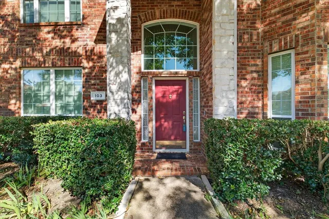 a front view of a multi story residential apartment building