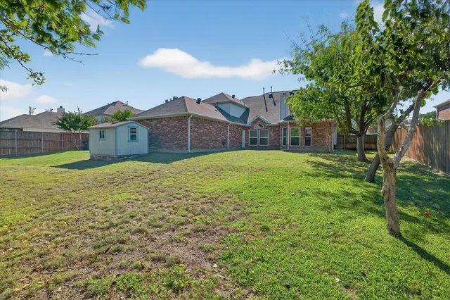 a house view with a garden space