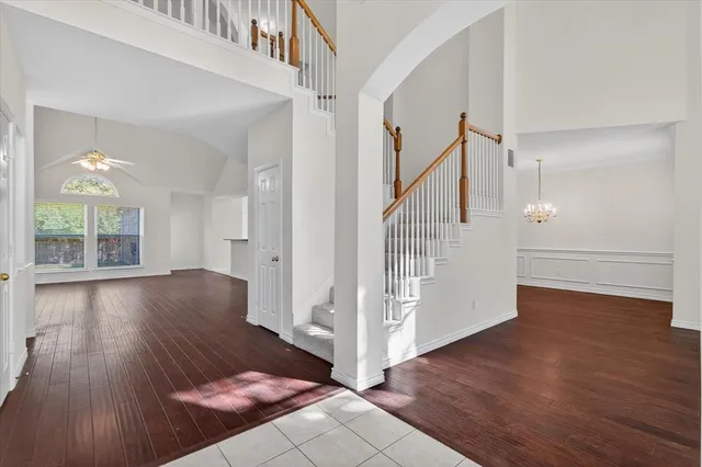 a view of entryway with wooden floor