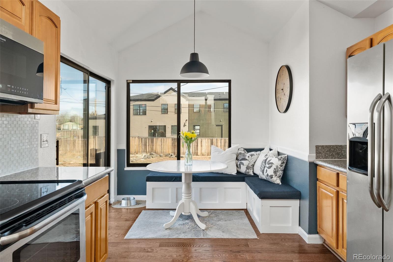 6404 Raleigh Street Arvada, CO 80003 - Photo 17 of 50 a living room with furniture fireplace and flat screen tv