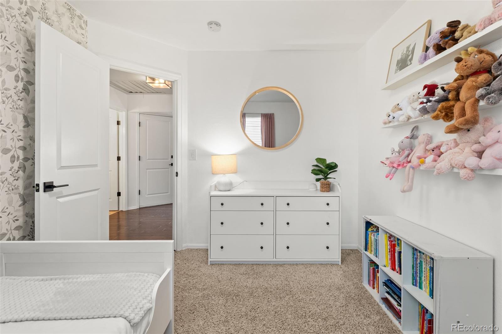 6404 Raleigh Street Arvada, CO 80003 - Photo 26 of 50 a bathroom with a bathtub sink and a mirror