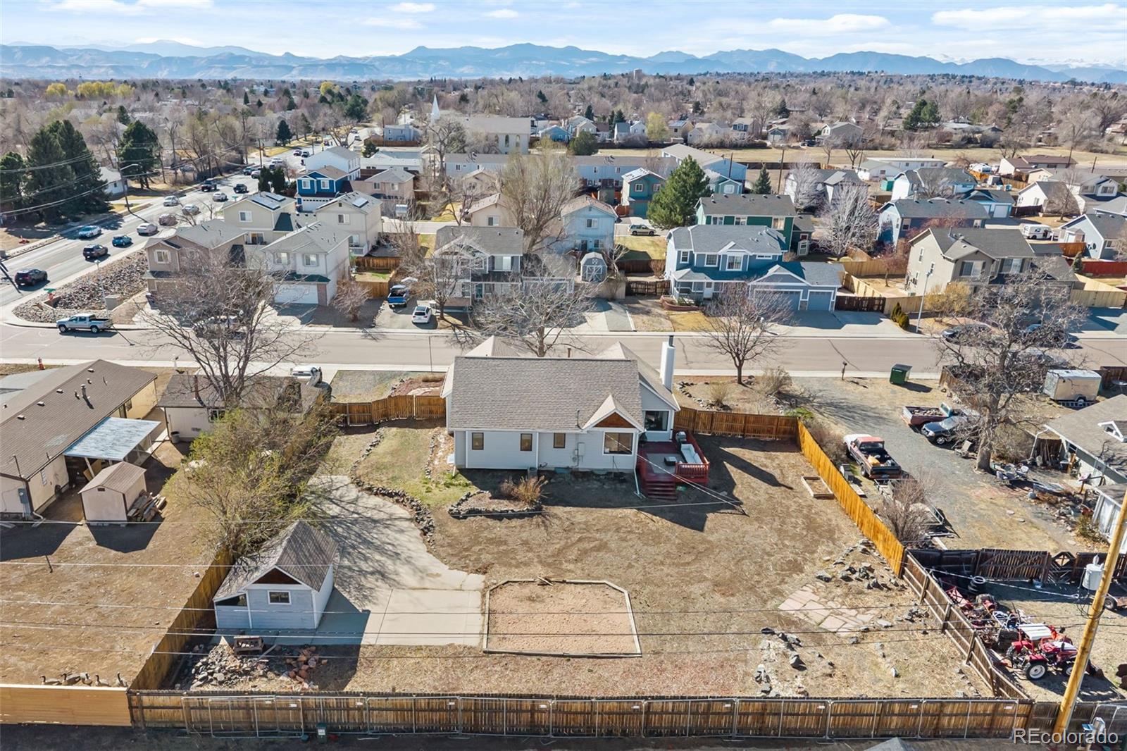 6404 Raleigh Street Arvada, CO 80003 - Photo 50 of 50 an aerial view of a house with a yard
