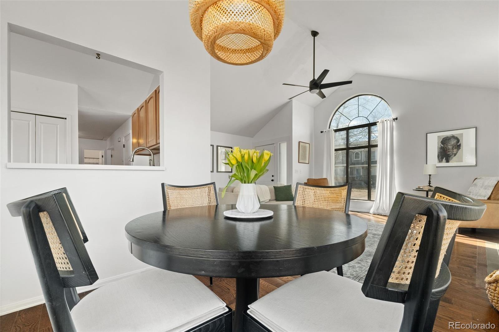 6404 Raleigh Street Arvada, CO 80003 - Photo 10 of 50 a view of a dining room with furniture