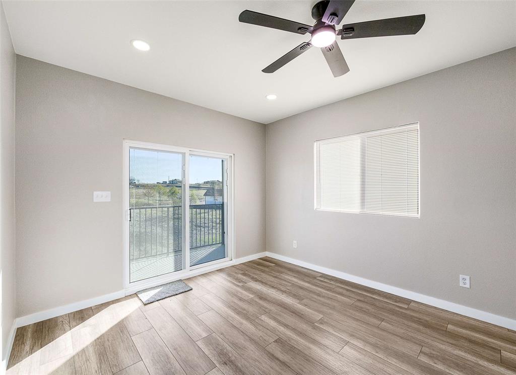 1061 Zmolek Road Ennis, TX 75119 - Photo 14 of 40 a view of an empty room with a window