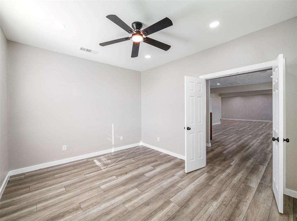 1061 Zmolek Road Ennis, TX 75119 - Photo 22 of 40 wooden floor in an empty room