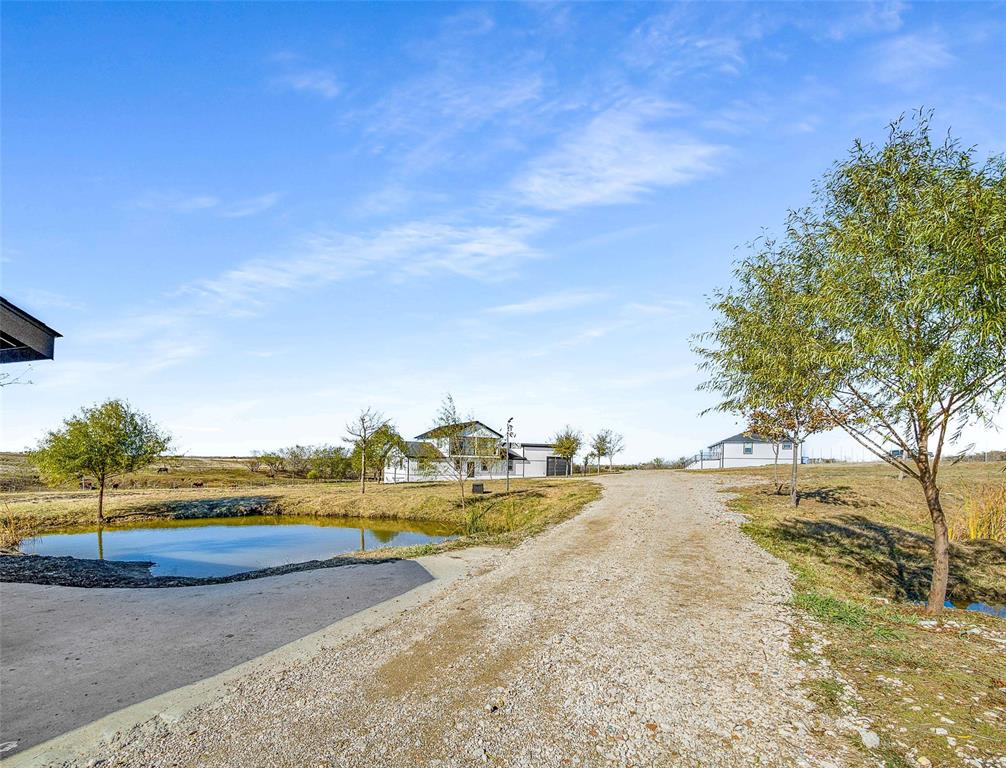 1061 Zmolek Road Ennis, TX 75119 - Photo 31 of 40 a view of an ocean and beach