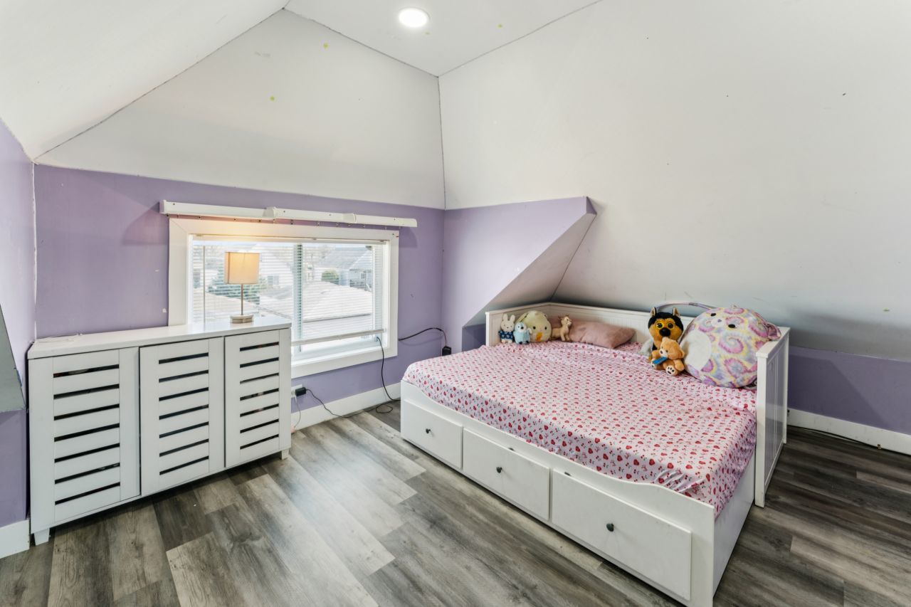 2547 Davisson Street River Grove, IL 60171 - Photo 13 of 31 a bedroom with a bed and a dresser