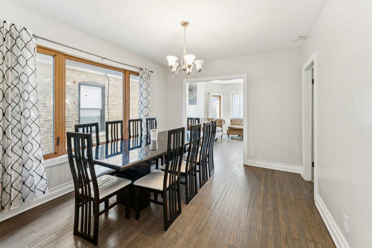 2547 Davisson Street River Grove, IL 60171 - Photo 4 of 31 a view of a dining room with furniture window and wooden floor