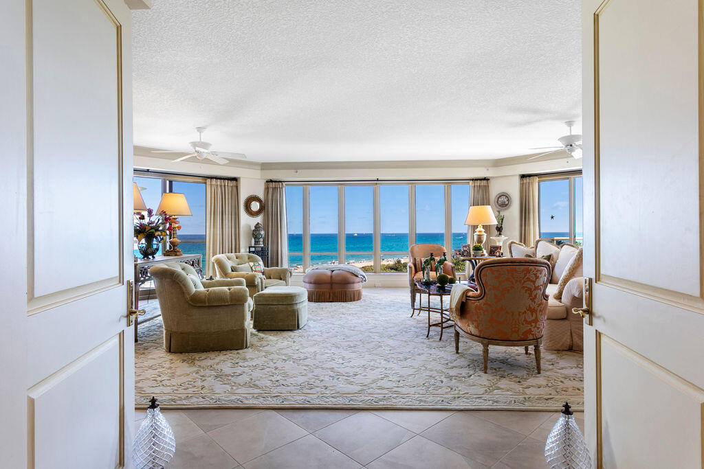 3920 North Ocean Drive, Unit 6A Singer Island, FL 33404 - Photo 3 of 71 a living room with furniture and a rug