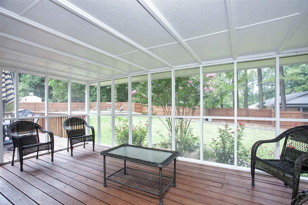 3829 Cole Mill Road Durham, NC 27712 - Photo 15 of 25 Screened porch off of family room with beautiful view of backyard and pool!