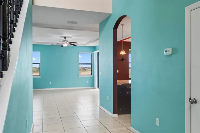 a kitchen with a sink a counter space and cabinets