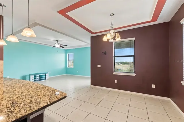 a kitchen with stainless steel appliances granite countertop a sink and a cabinets