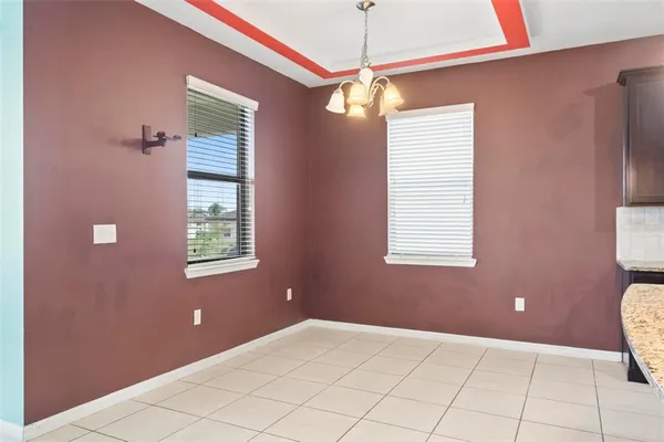 a view of a hallway with a window