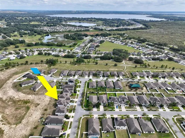 a view of room with window and wooden floor