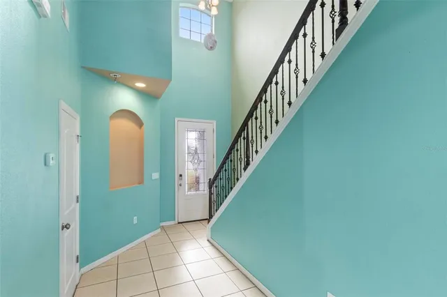 a kitchen with a sink and a refrigerator